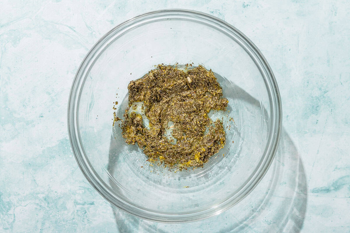 The marinade for the chicken an potatoes recipe in a bowl.