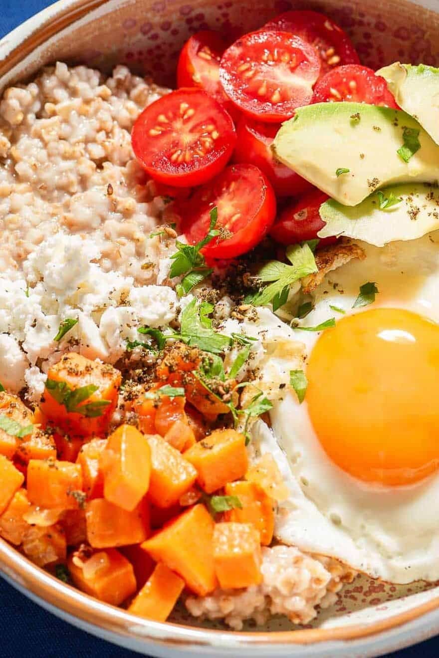 A close up of a savory oatmeal bowl.