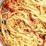 The puttanesca recipe in a tall sided skillet.