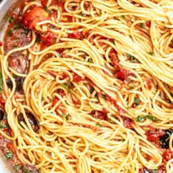 The puttanesca recipe in a tall sided skillet.
