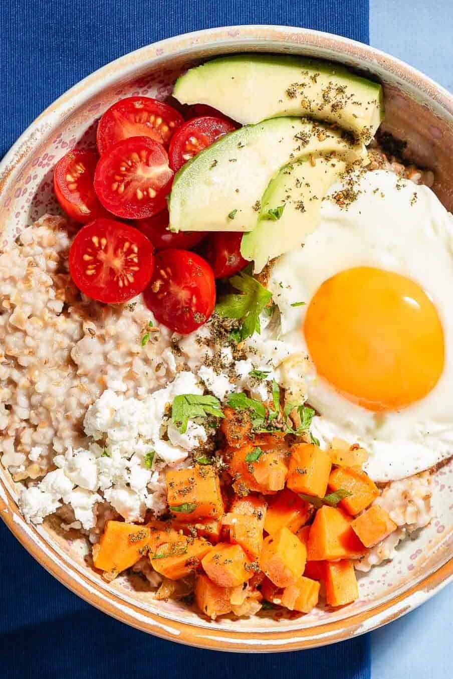 An overhead photo of a savory oatmeal bowl.
