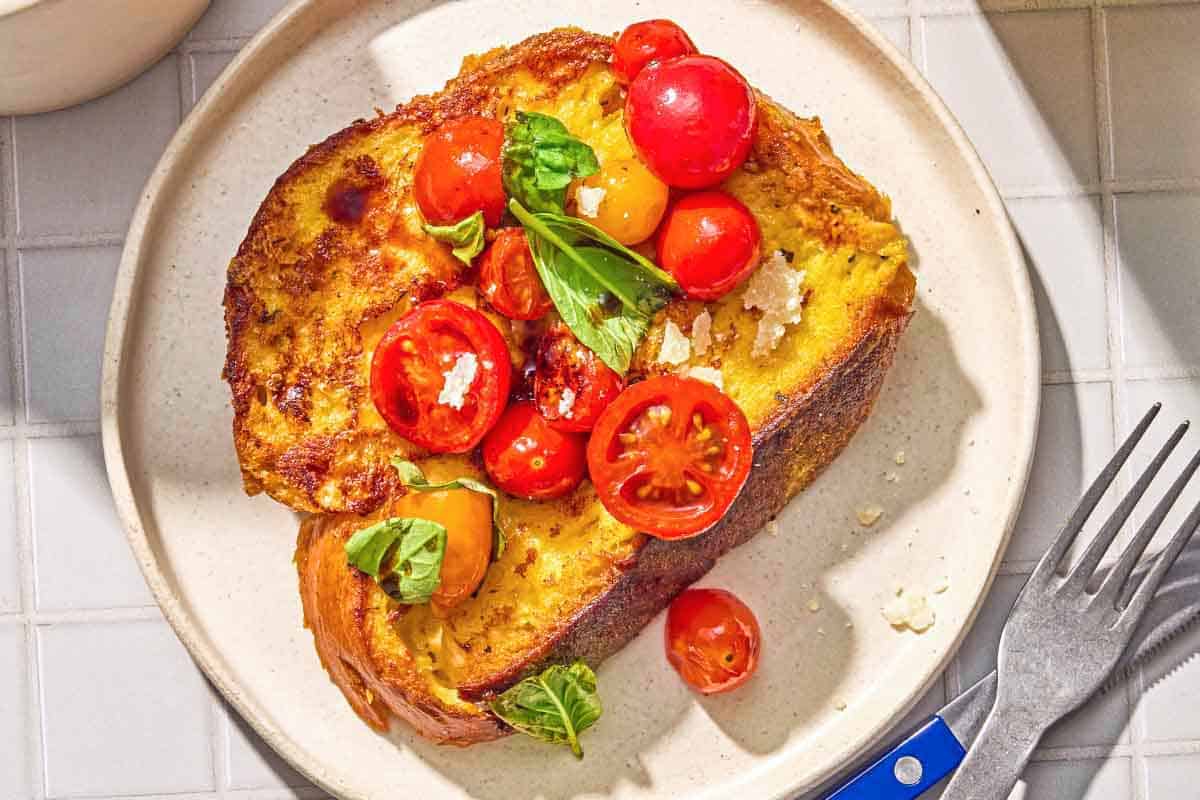 Savory French Toast with Parmesan, Blistered Cherry Tomatoes, and Basil