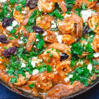 An overhead photo of Greek shrimp in a skillet.