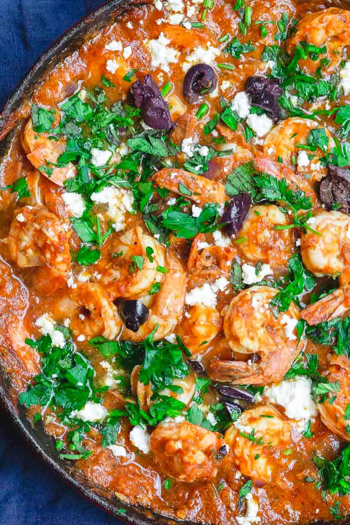 Greek shrimp in a skillet.