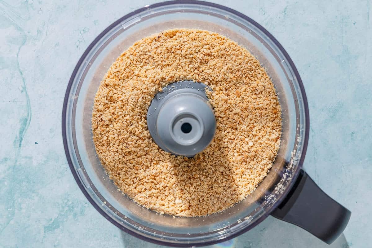 ground almonds and hazelnuts in the bowl of a food processor.