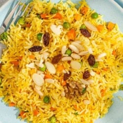 Rice pilaf on a plate with a fork.