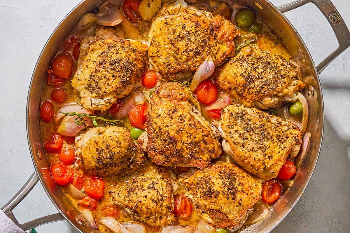 The chicken provencal in a skillet.