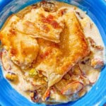 A serving of bread pudding in a bowl.