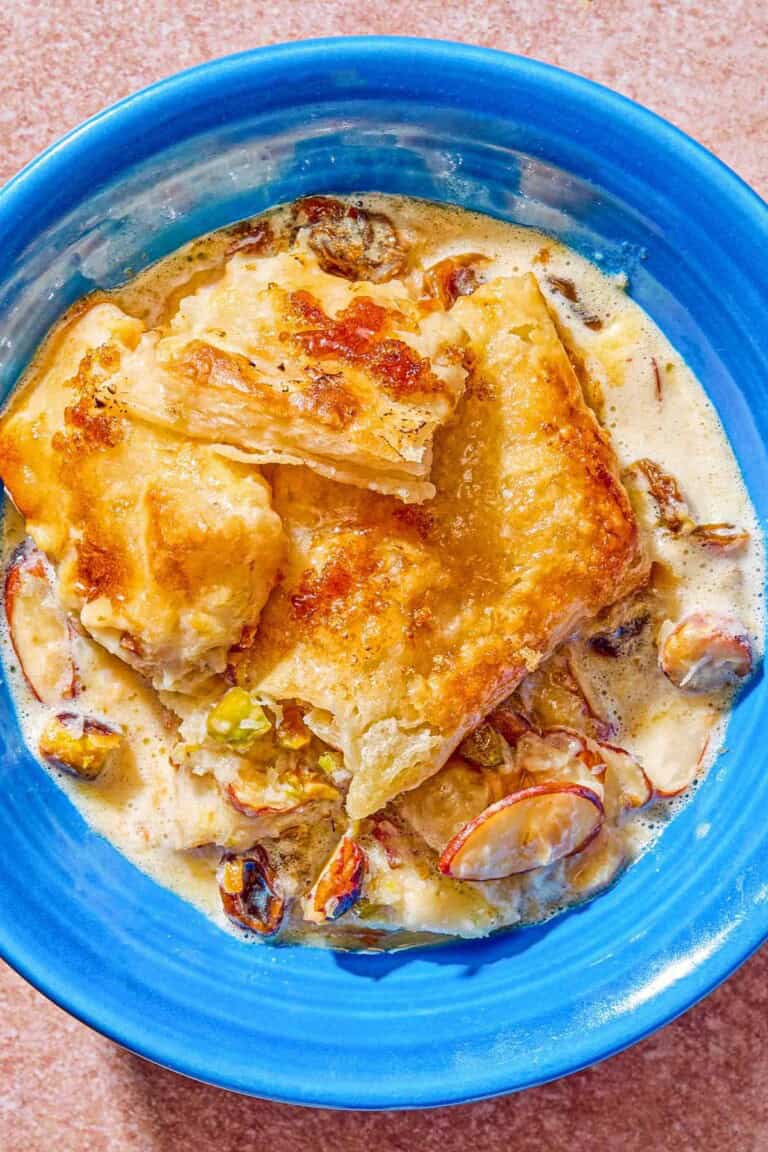 A serving of bread pudding in a bowl.