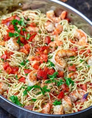 Shrimp pasta in a deep sided skillet.