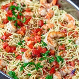 Shrimp pasta in a deep sided skillet.