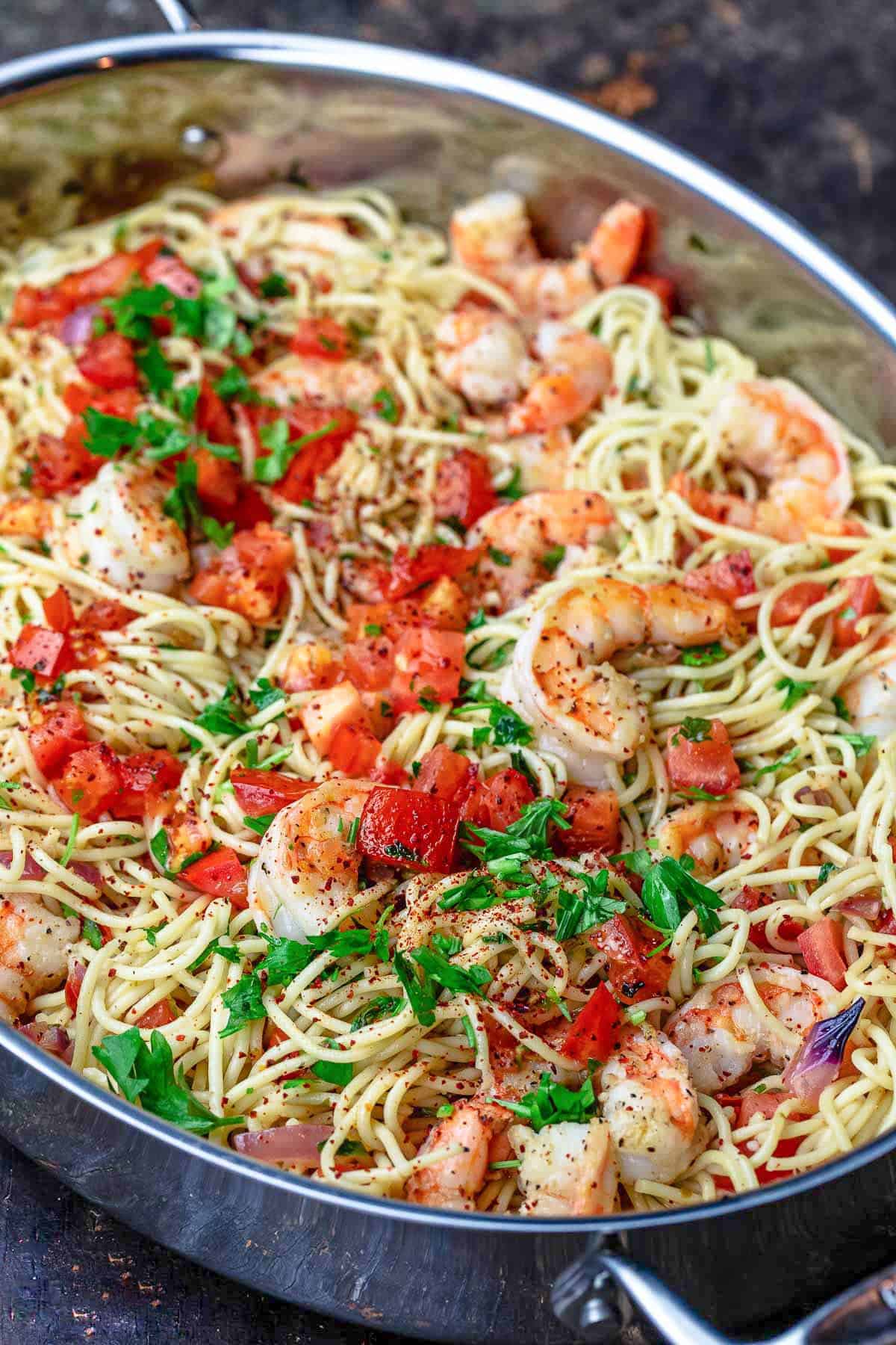 Shrimp pasta in a deep sided skillet.