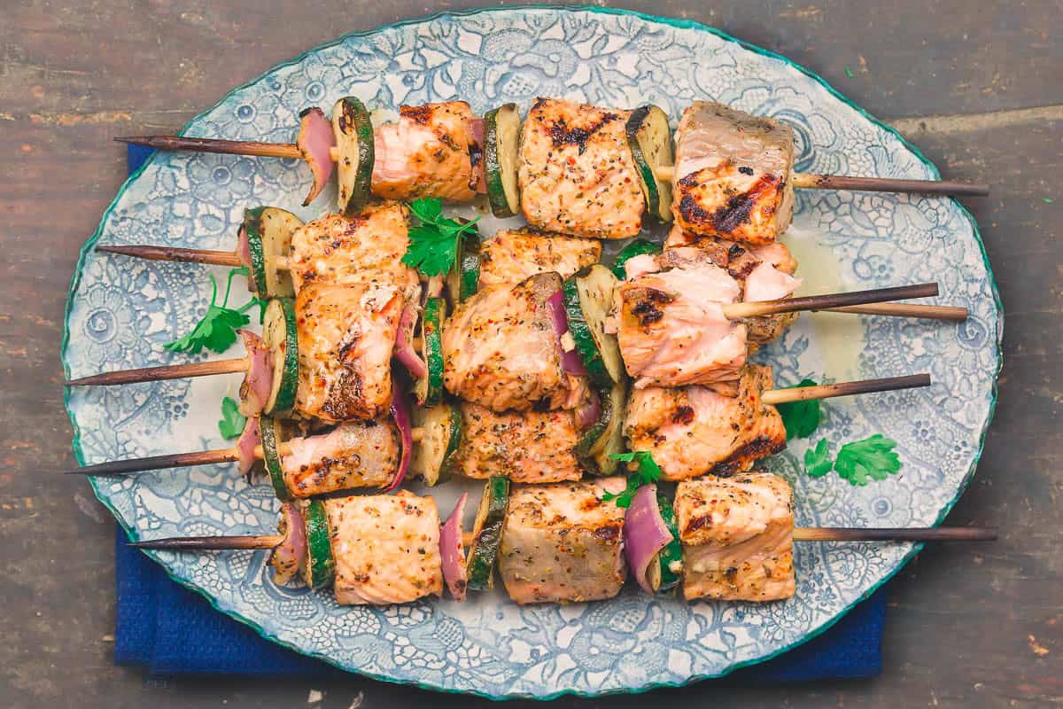 An overhead photo of salmon kabobs on a platter.