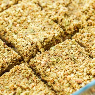 A close up of several no bake dessert bars in a baking dish.