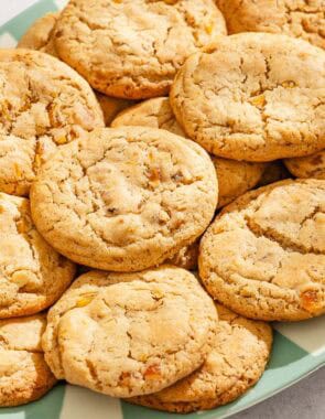 Several apricot cookies on a platter.