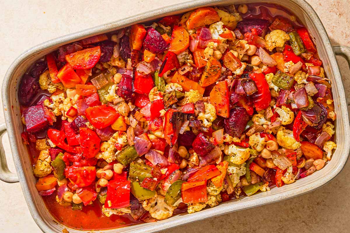 Oven roasted vegetables in a baking dish.