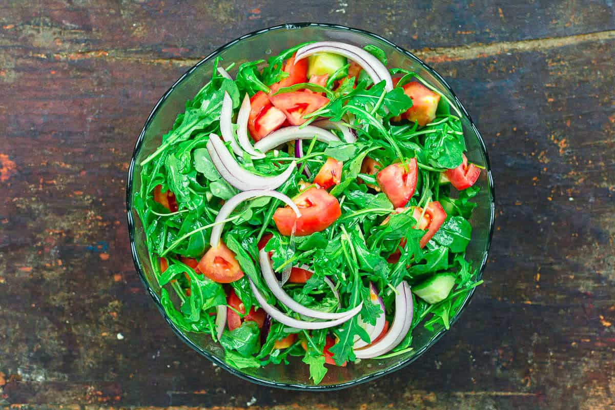 An overhead photo of the salad for the chicken shawarma bowl.