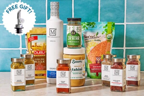 The Mediterranean Diet Starter Kit on a table with a blue tile background.