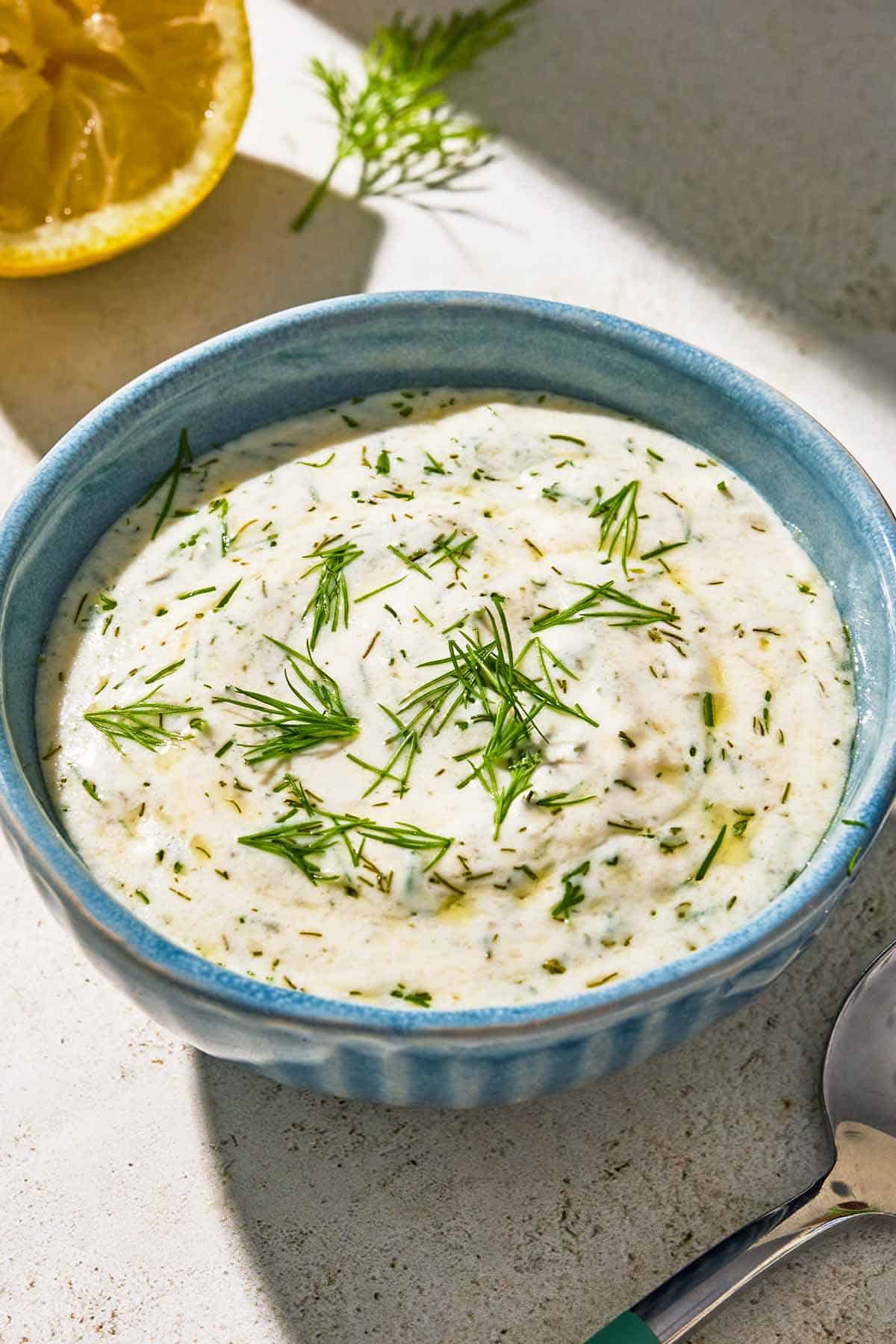Dill sauce for salmon in a bowl.