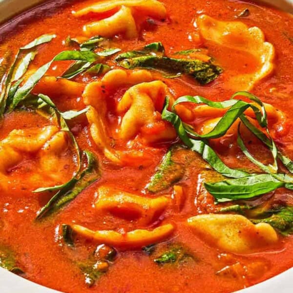 Tomato tortellini soup in a bowl.