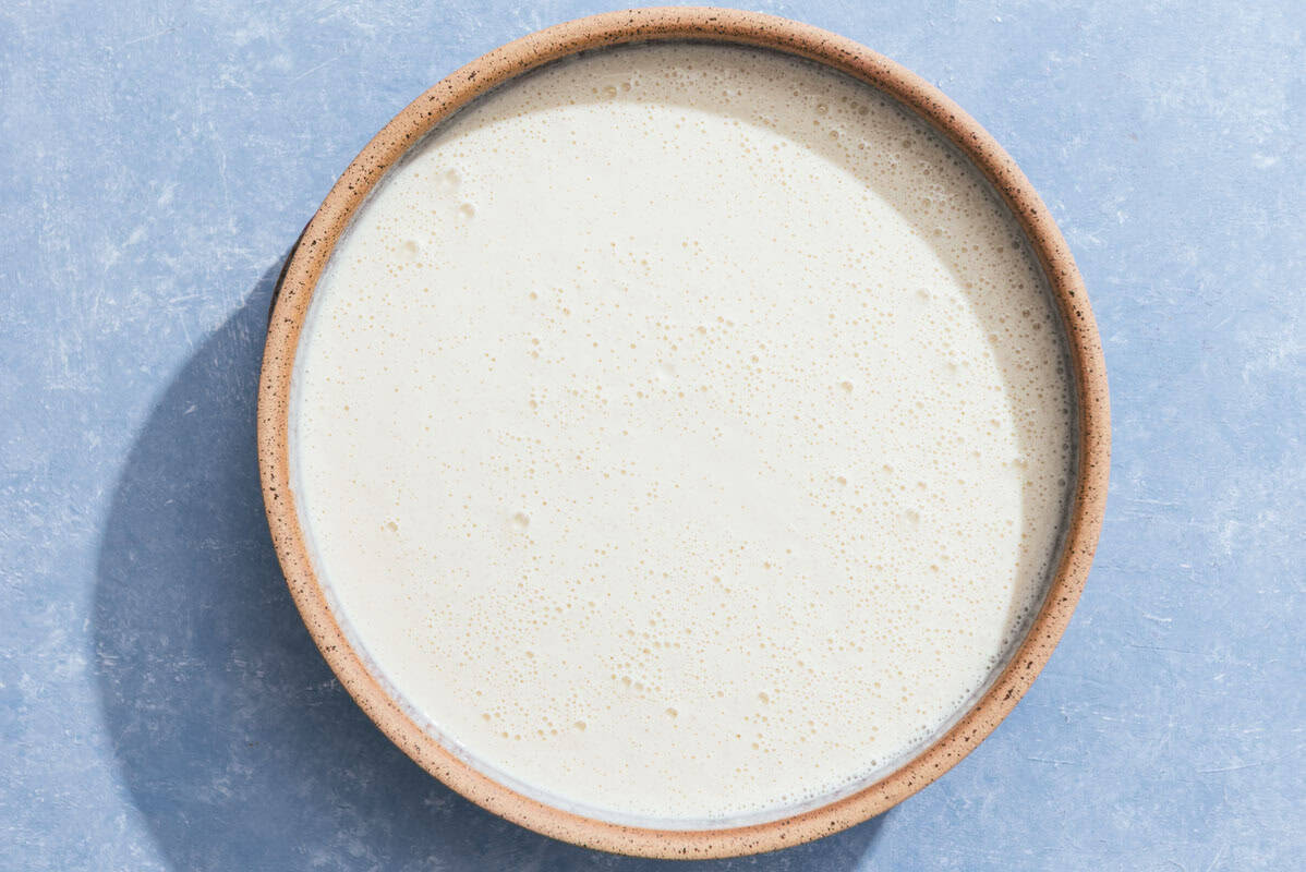 The batter for the baghrir resting in a bowl.