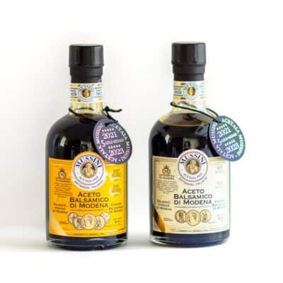 Two bottles of balsamic vinegar.