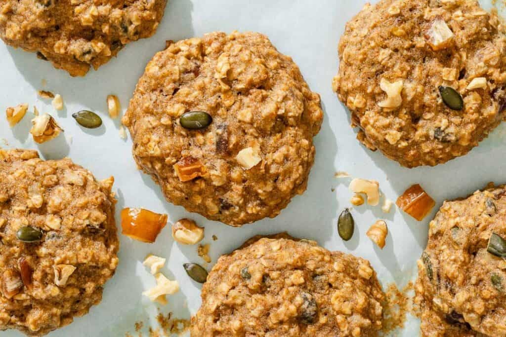 Baked breakfast cookies on a sheet pan.