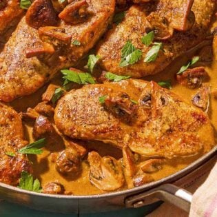 Chicken marsala in a skillet.