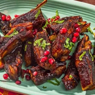 Lamb ribs on a platter.