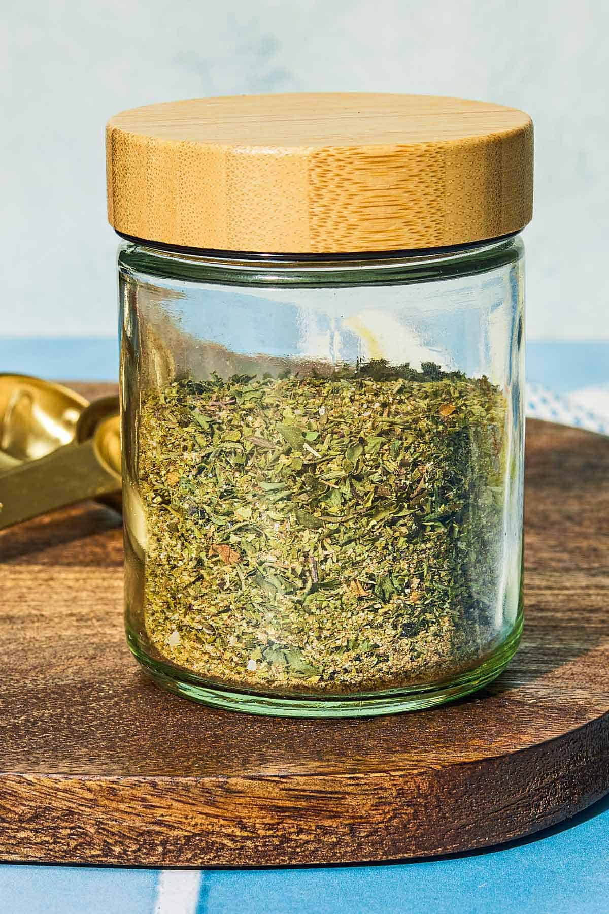 Greek seasoning in a jar with a lid.