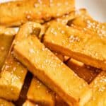 Chickpea panisses on a platter.