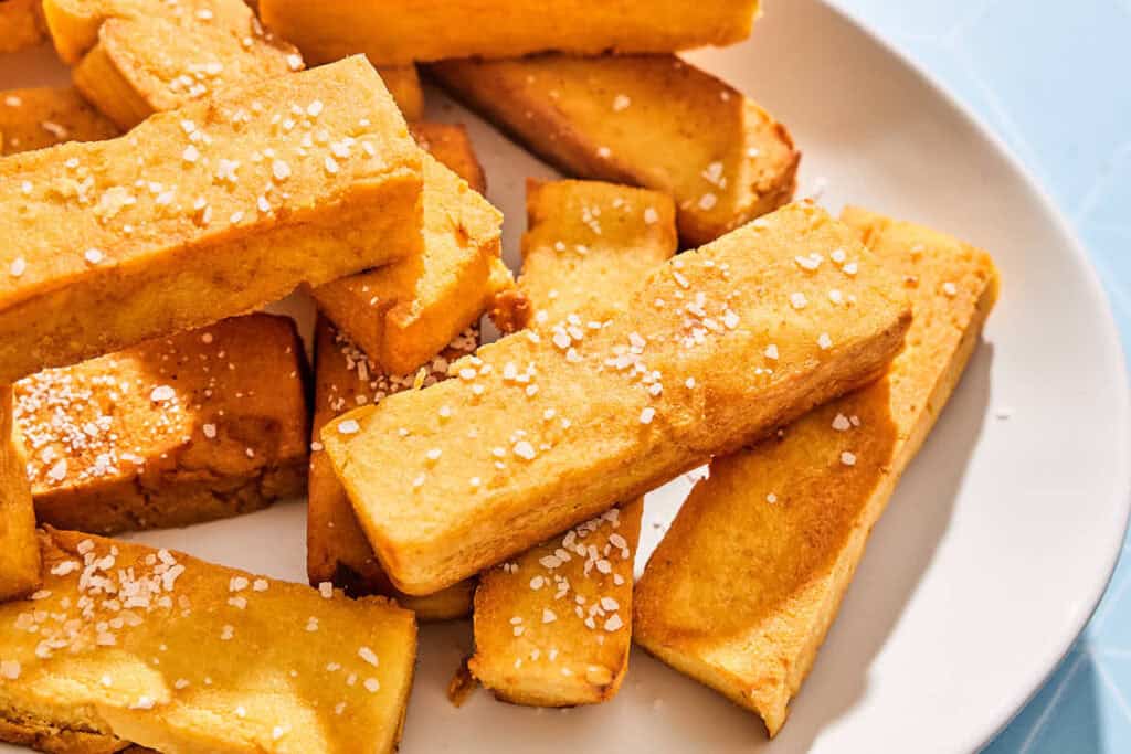 Chickpea panisses on a platter.
