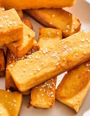 Chickpea panisses on a platter.