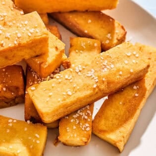 Chickpea panisses on a platter.