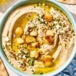 Roasted garlic hummus in a bowl.