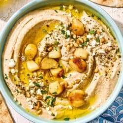 Roasted garlic hummus in a bowl.