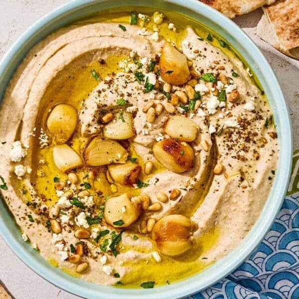 Roasted garlic hummus in a bowl.