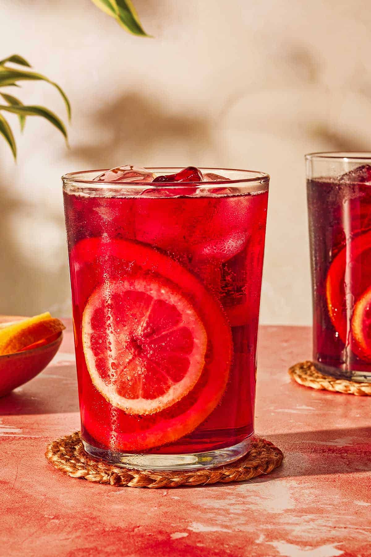 A glass of tinto de verano, a refreshing Spanish wine drink, on a coaster. 