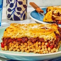 A slice of the pastitsio recipe on a plate.