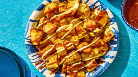Fried potatoes for the patatas bravas in a serving bowl.