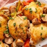 Chicken scarpariello on a platter.
