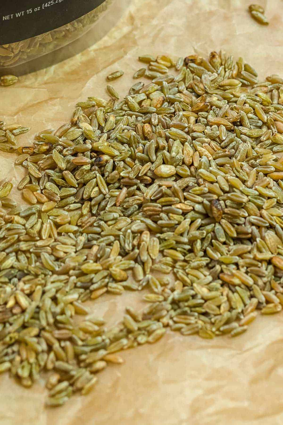 Uncooked wholegrain freekeh showing its coarse, roasted texture