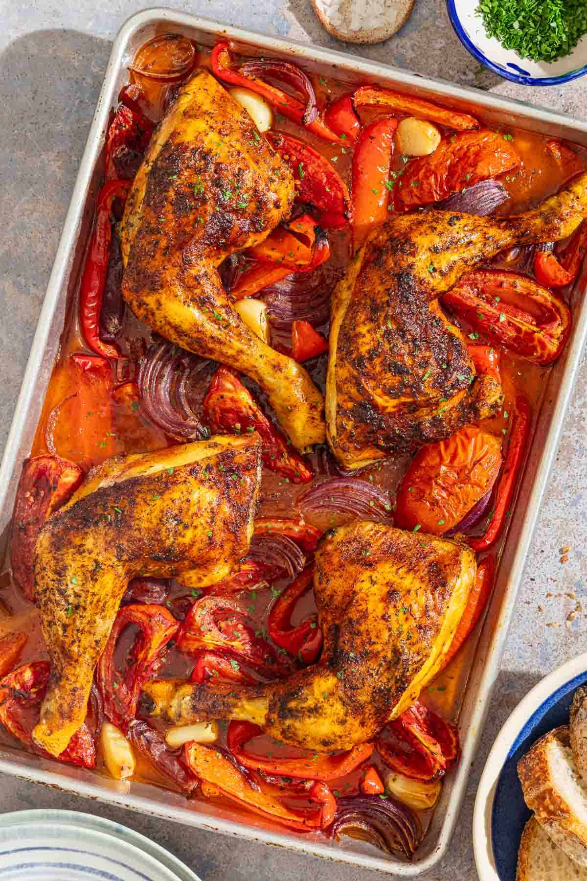 Spanish paprika chicken on a sheet pan.