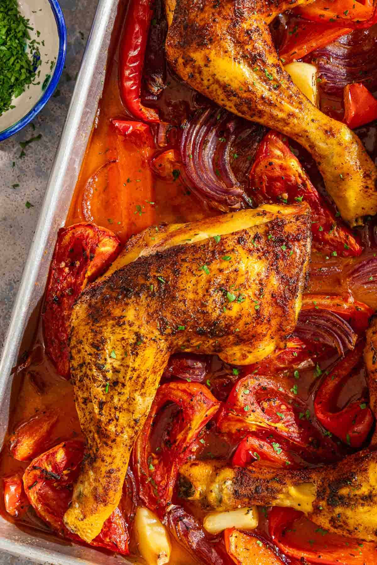Spanish paprika chicken on a sheet pan.