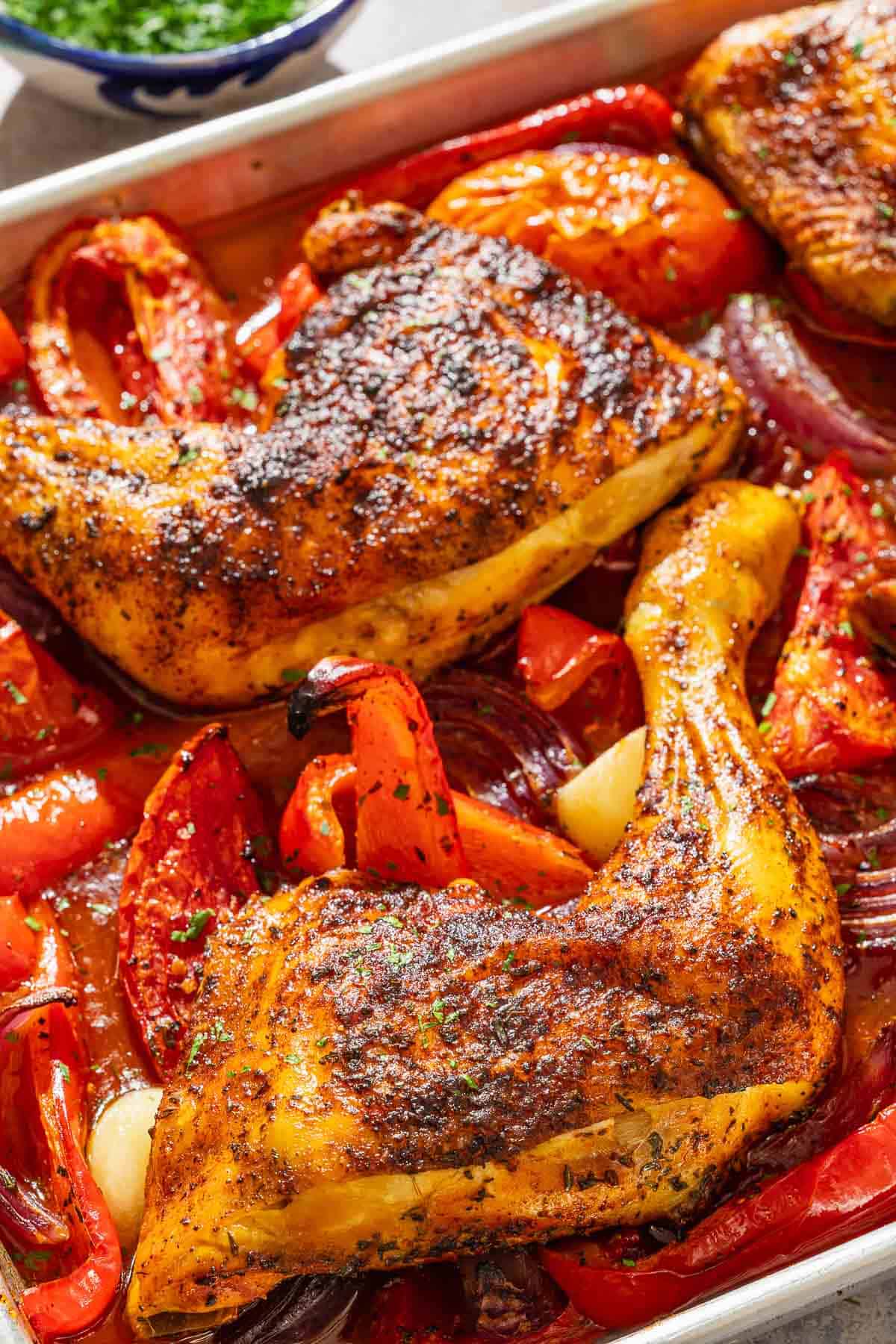 Spanish paprika chicken on a sheet pan.