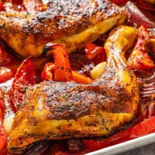 Spanish paprika chicken on a sheet pan.