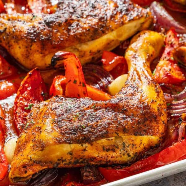 Spanish paprika chicken on a sheet pan.